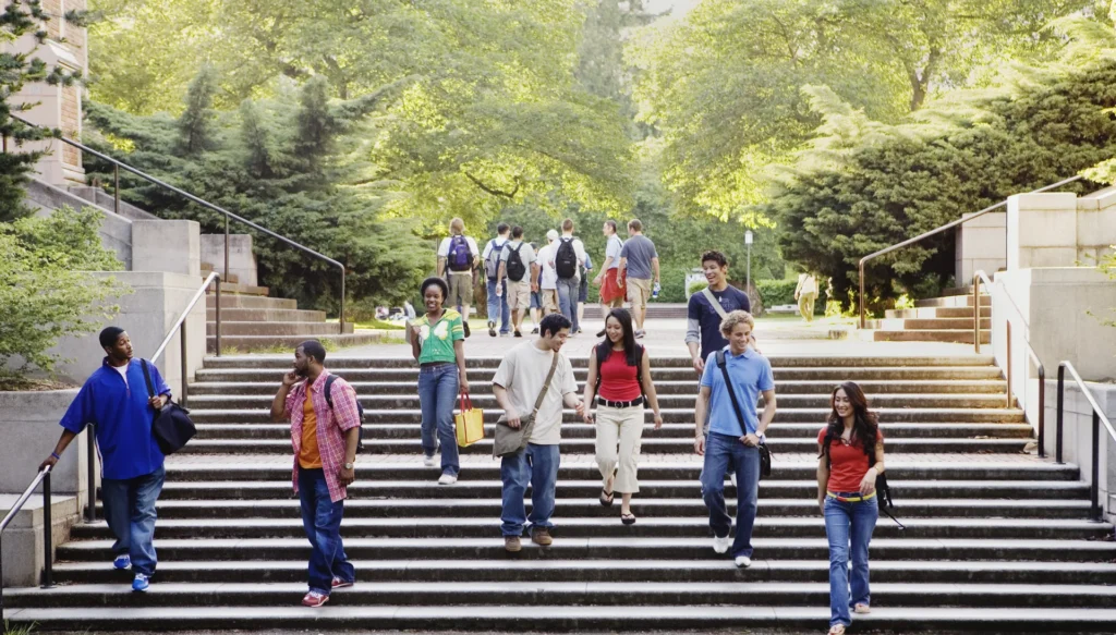 College students walking on campus stairs in Canada